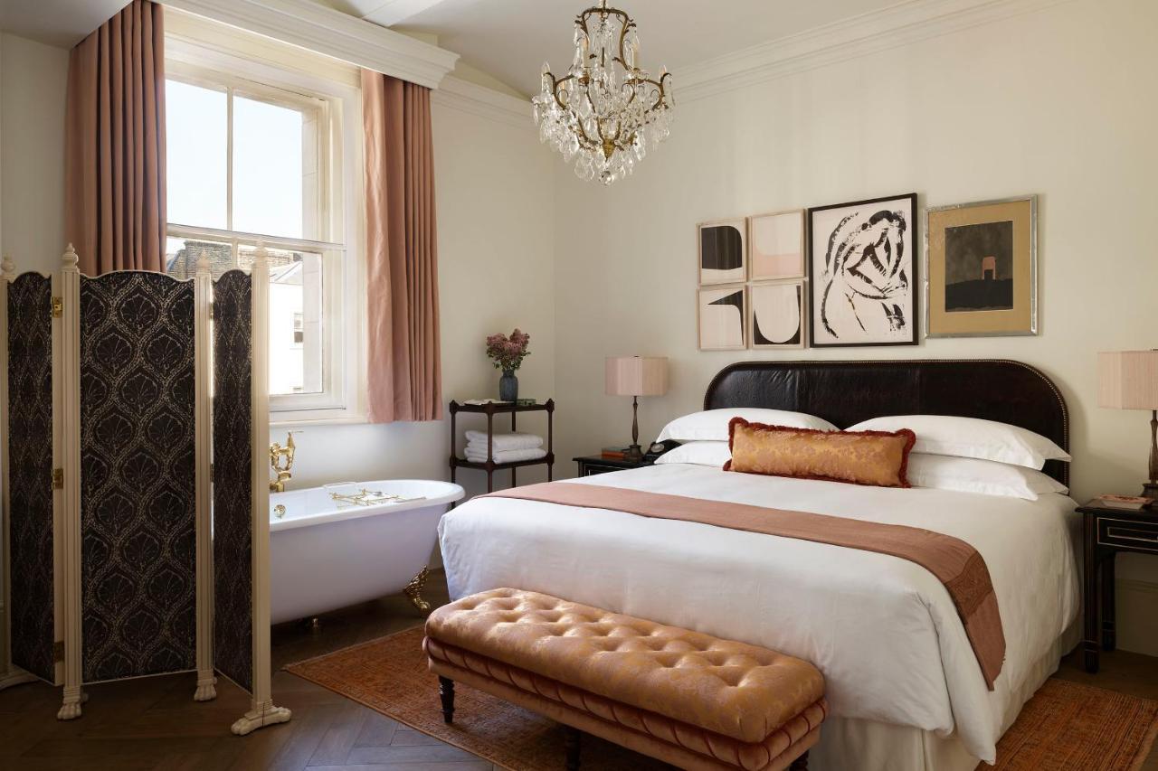 Nomad London Hotel Luaran gambar A bedroom at the Hotel George Washington
