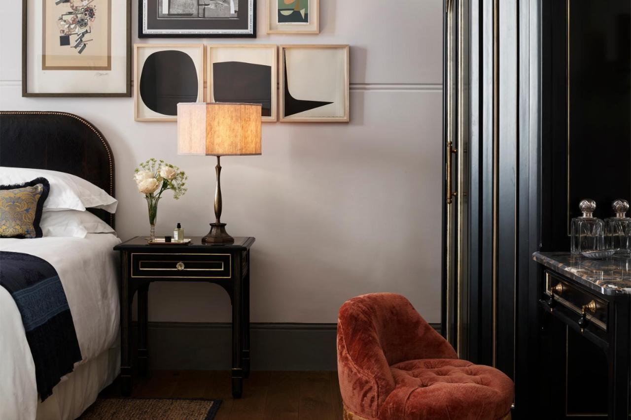 Nomad London Hotel Luaran gambar A bedroom at The Ivy Hotel